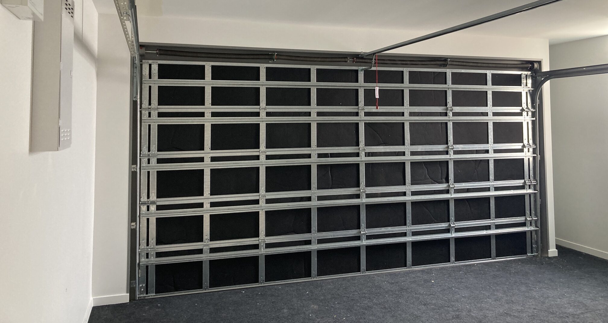 Cutaway of an insulated sectional garage door panel